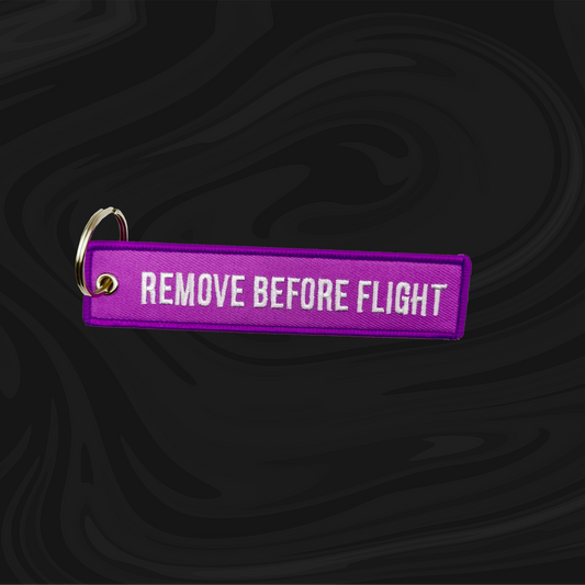 FIOLETOWY HAFT BRELOK