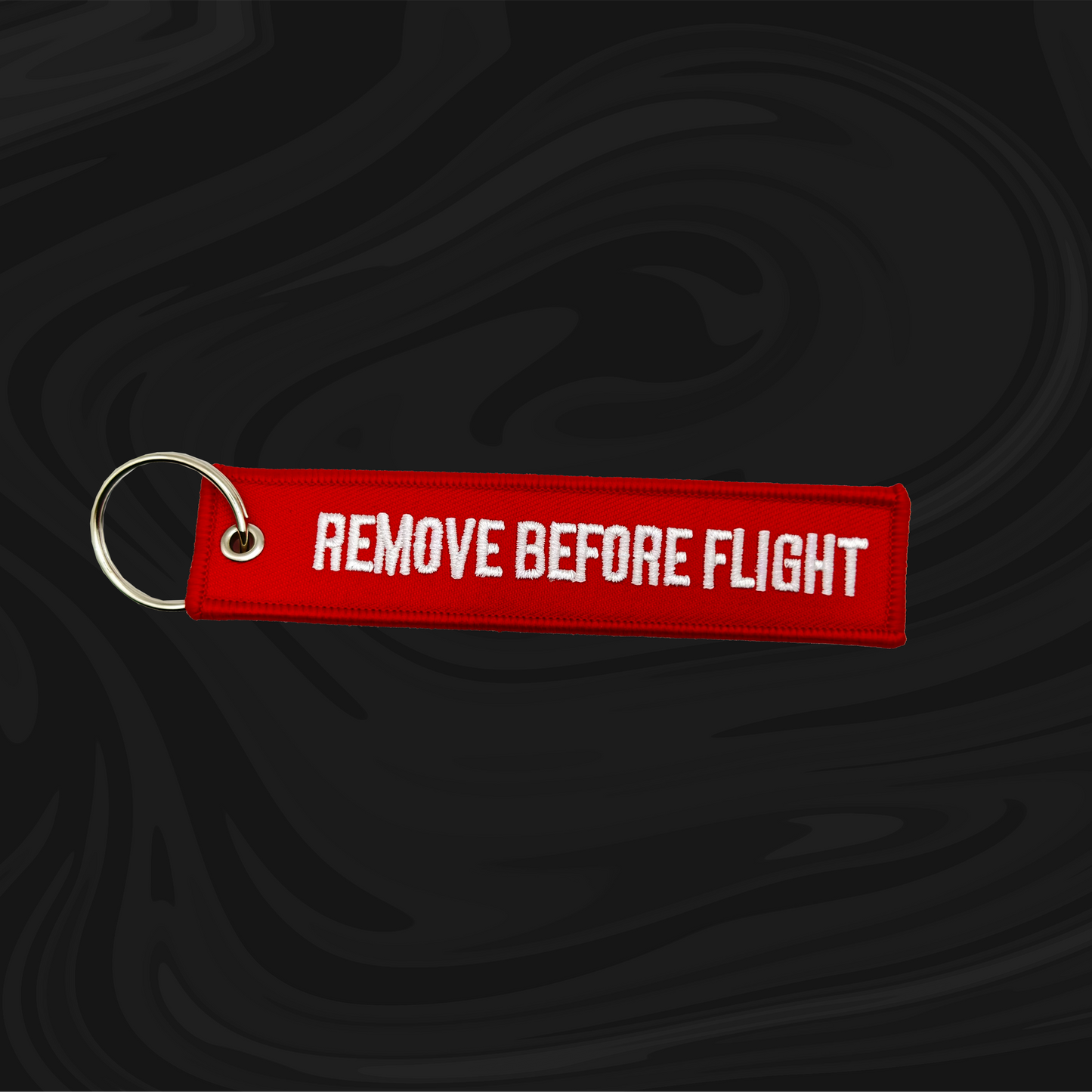 CZERWONY HAFT BRELOK